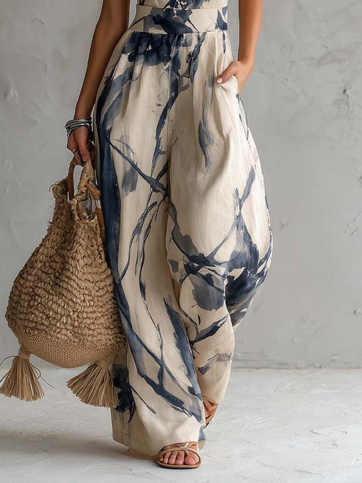 Halterhals jumpsuit met wijde pijpen, ink wash print en zakken