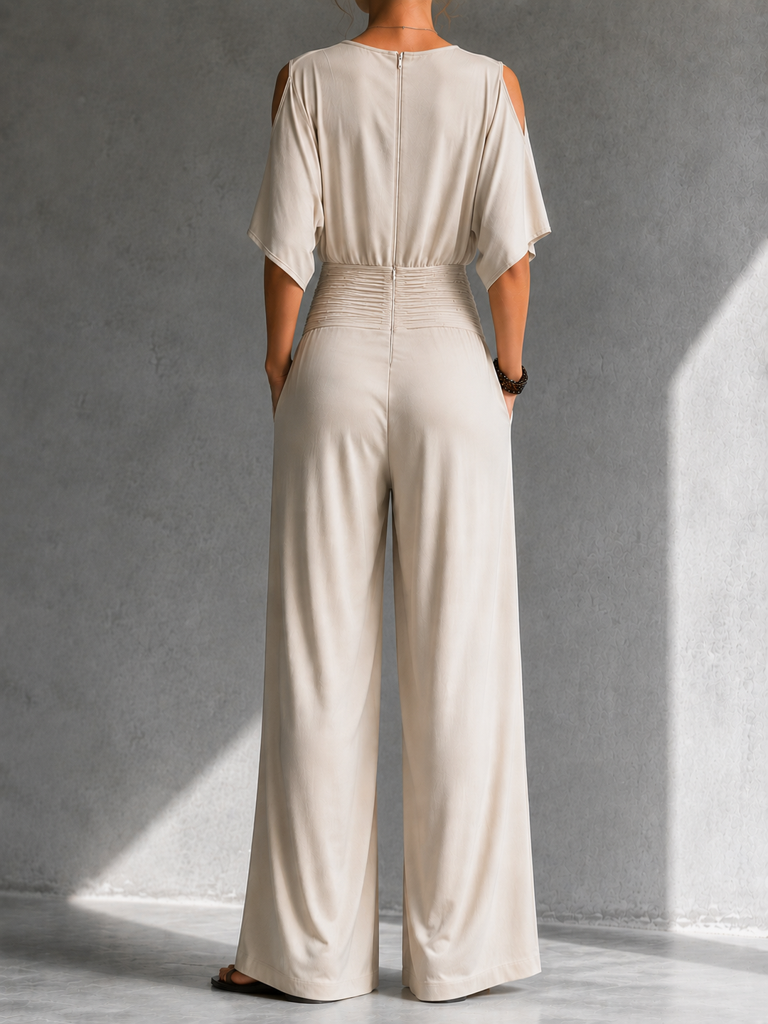 Zeni - Elegante wikkeljumpsuit met wijde pijpen