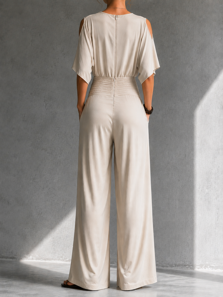 Zeni - Elegante wikkeljumpsuit met wijde pijpen