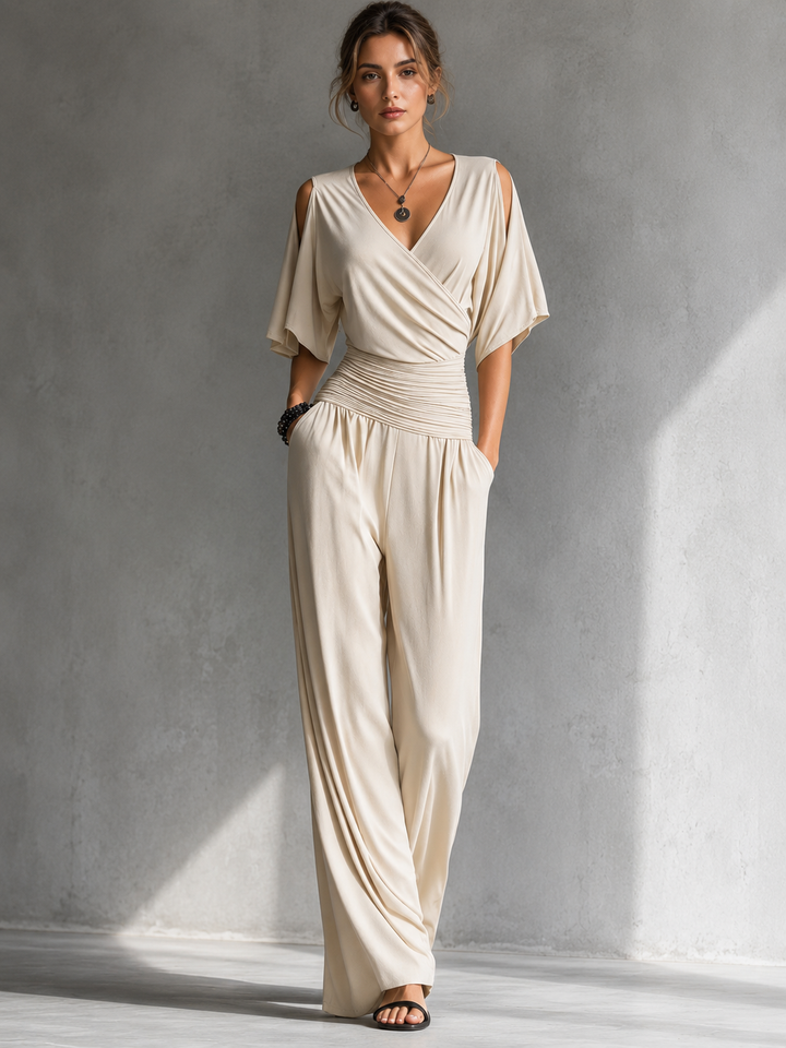 Zeni - Elegante wikkeljumpsuit met wijde pijpen