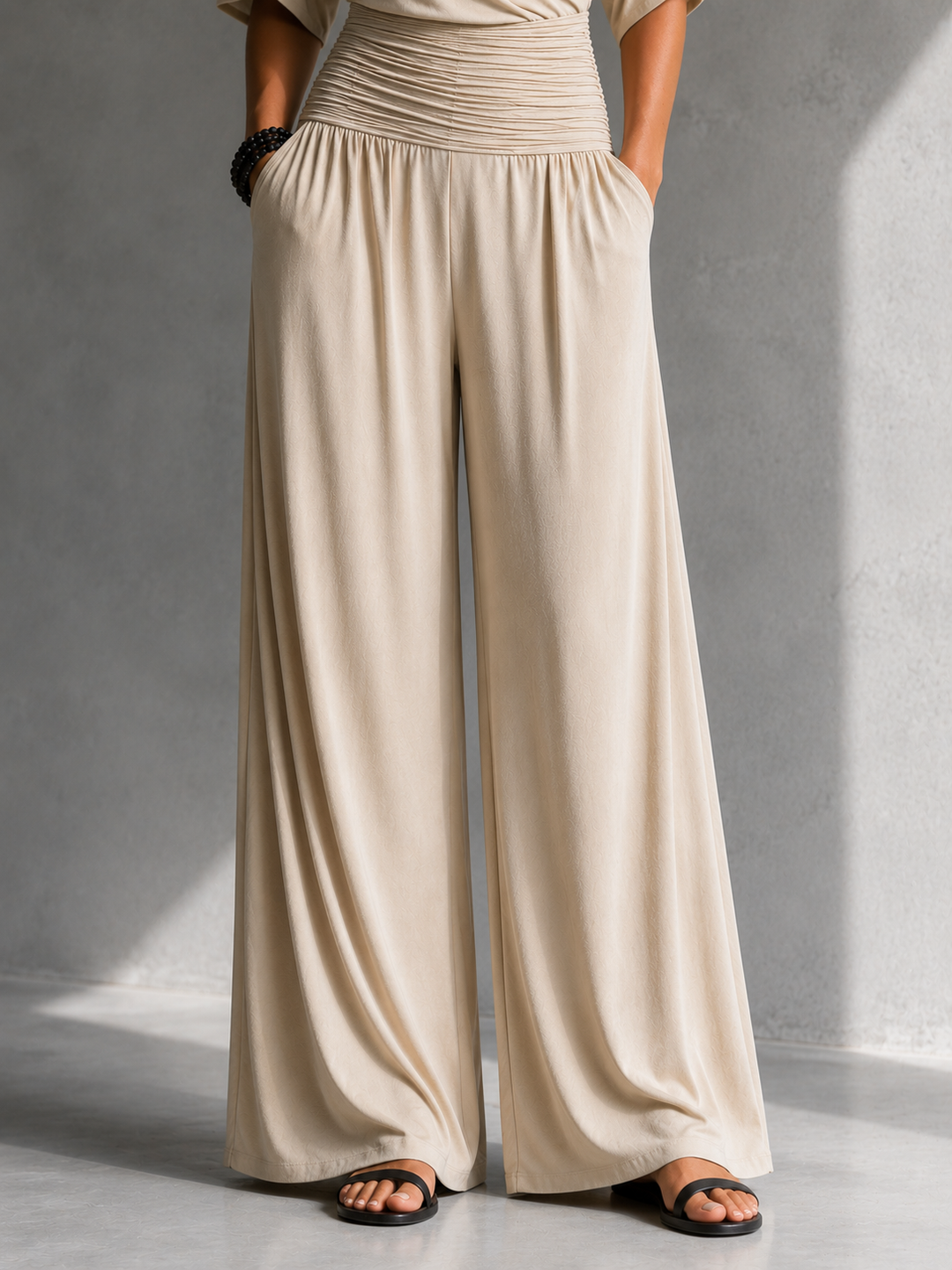Zeni - Elegante wikkeljumpsuit met wijde pijpen