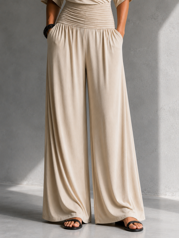 Zeni - Elegante wikkeljumpsuit met wijde pijpen