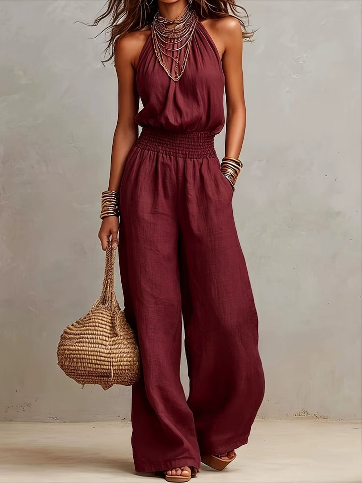 VALERIA | Jumpsuit met wijde pijpen en halternek