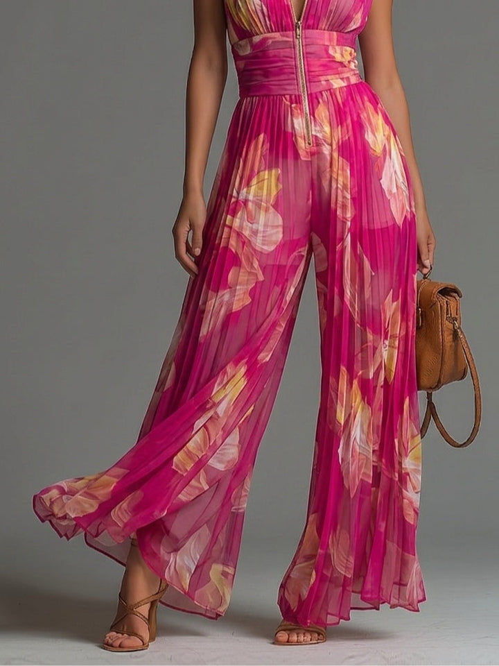 Fuchsia bloemenprint mouwloze geplooide geplooide chiffon jumpsuit met wijde pijpen