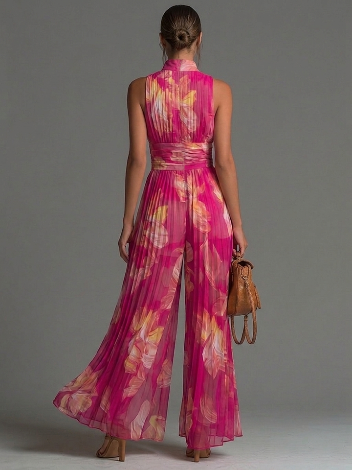 Fuchsia bloemenprint mouwloze geplooide geplooide chiffon jumpsuit met wijde pijpen
