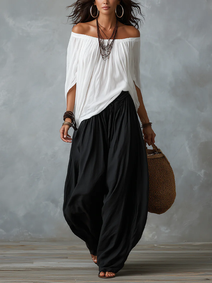 Witte Off-Shoulder Top En Losvallende Lantaarn Broek Set